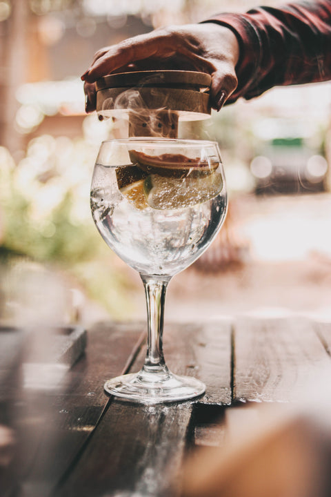 Professional home bar tools including cocktail shaker, jigger, 
and strainer — barware collection at Sipcase